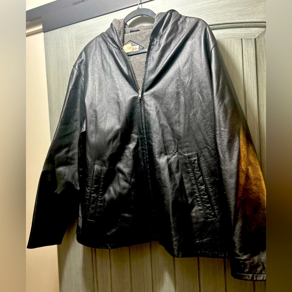Woman’s Hooded Leather Jacket with Fleece lining.  Size XL